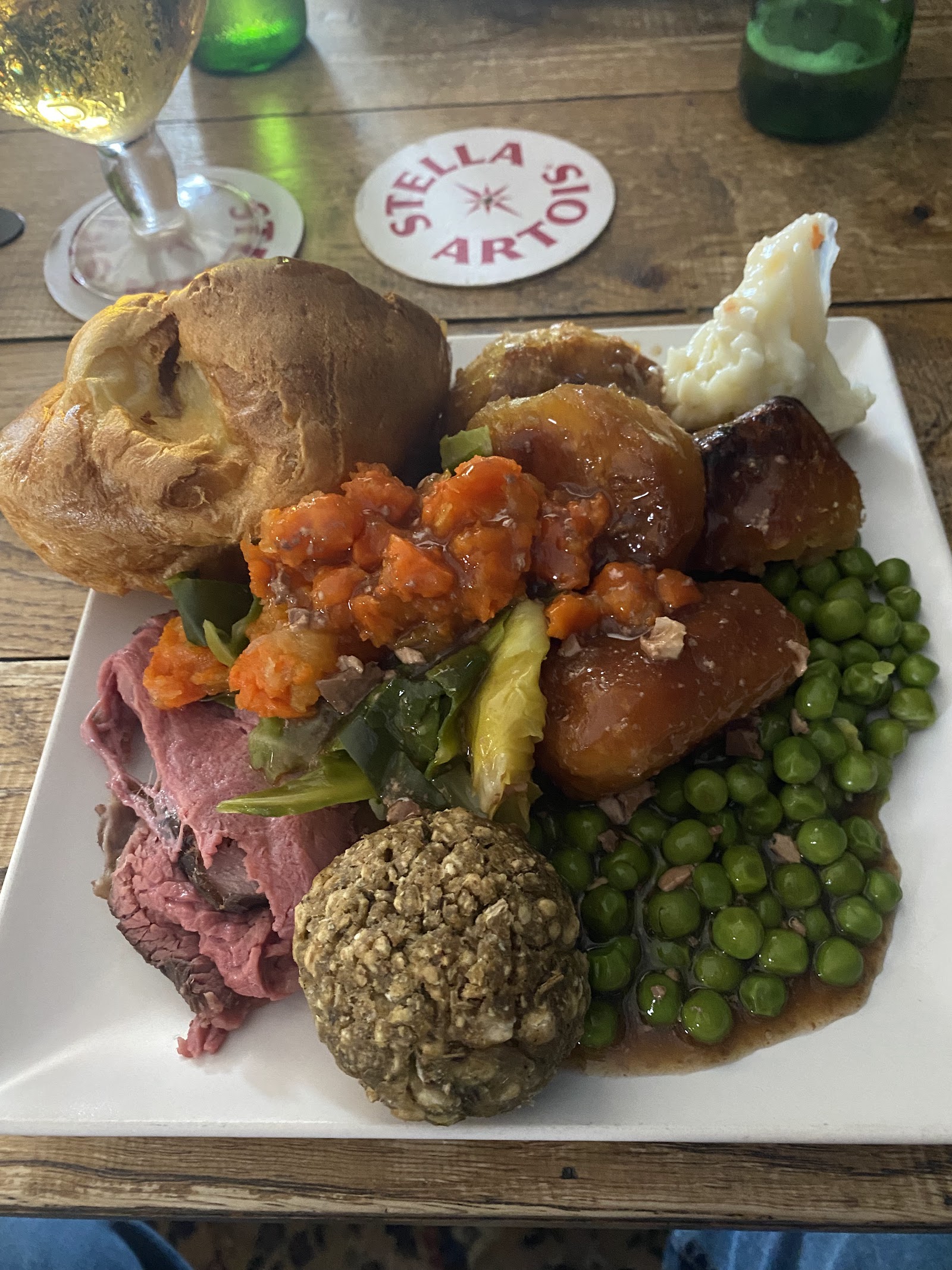 Sunday roast carvery with turkey, roast potatoes, vegetables, and gravy